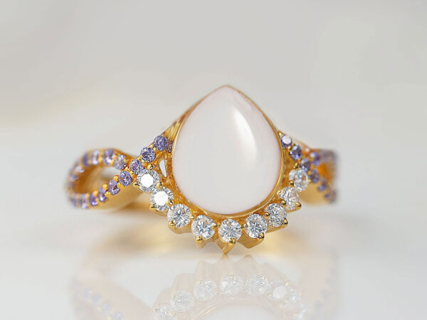 breastmilk jewelry ring for DIY kit from KeepsakeMom in yellow gold alexandrite crystals teardrop shaped stone