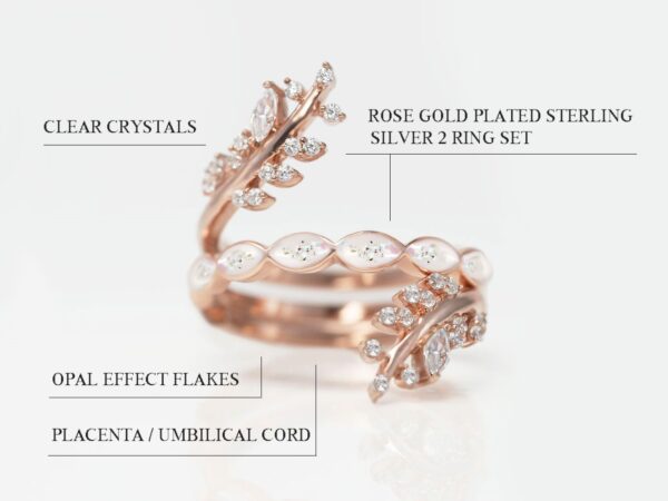 breastmilk sterling silver rose ring gold plated two ring set with top ring open branches shape with clear crystals and the middle main ring filled with breastmilk fine band marquise style leaves with breastmilk opal flakes and placenta flakes and the bottom add-on ring with clear gems diagram describing features on white background from keepsakemom