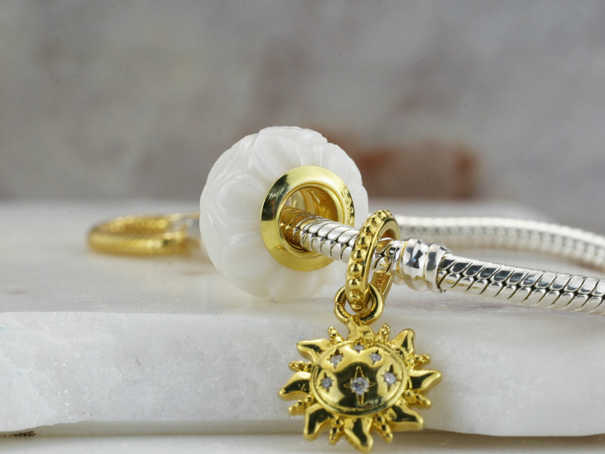 breastmilk jewelry flower bead with sun charm yellow gold silver pandora style keepsakemom