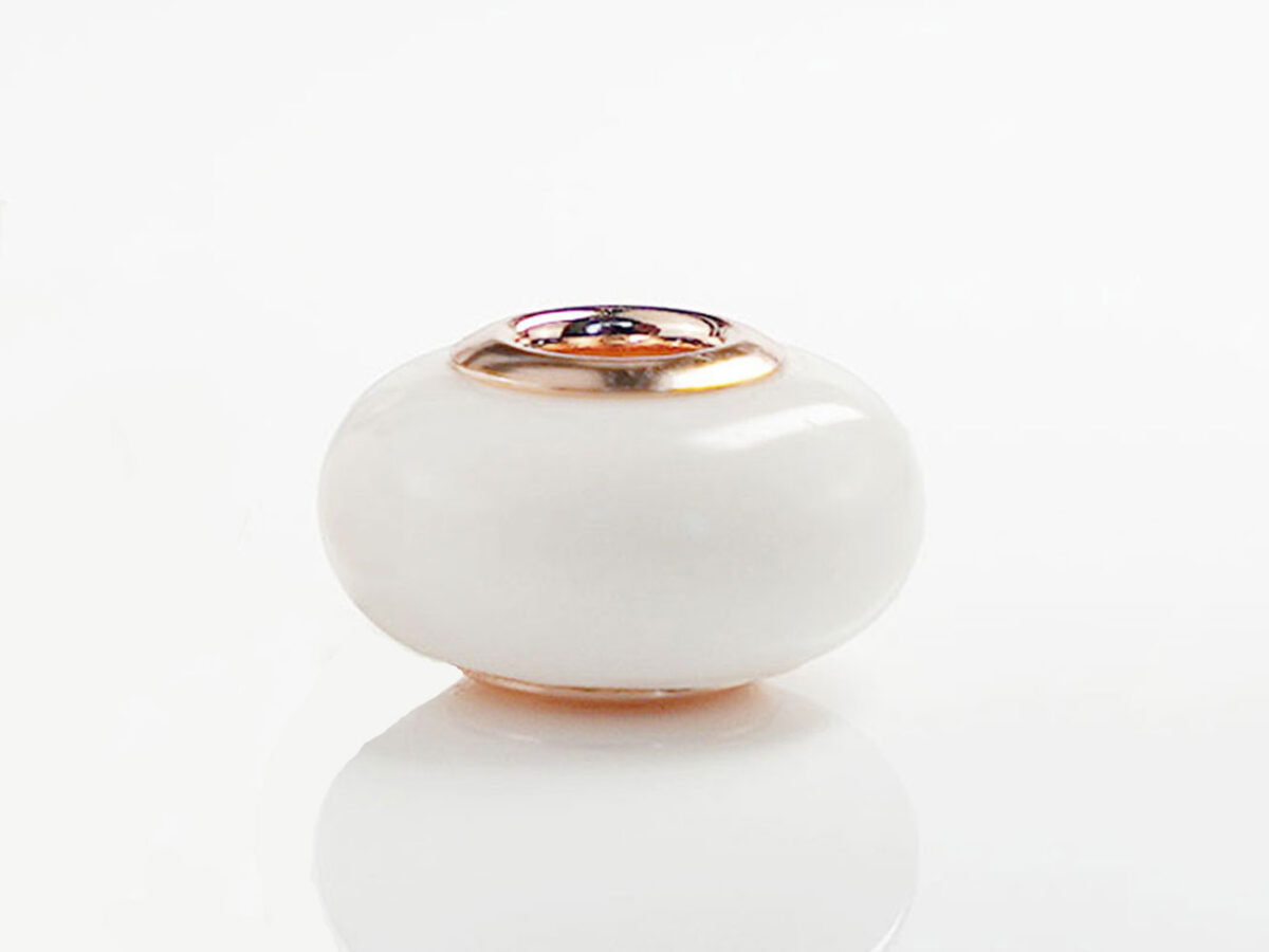 breastmilk bead with rose gold bead cores keepsakemom on white background simple