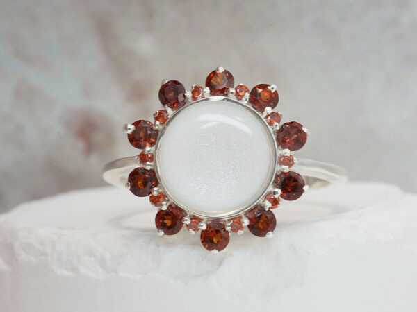 breastmilk ring flower shape with large center breastmilk round stone crystals halo with birth month color gems from keepsakemom red gems