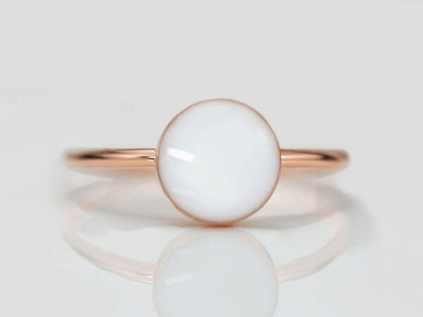 breastmilk jewelry ring simple classic larger round stone sterling silver rose gold plated from keepsakemom on white background