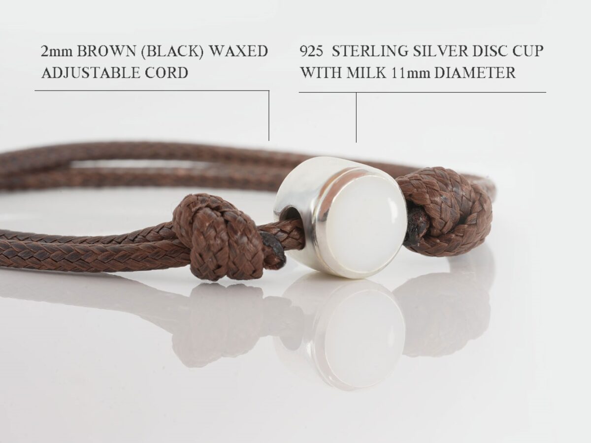 breast milk bracelet sterling silver disc filled with breastmilk for men on brown thick waxed adjustable cord on white background feature describing diagram from keepsakemom