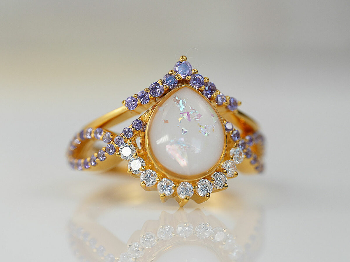 breastmilk jewelry ring crystals teardrop birth month color crystals teardrop from KeepsakeMom yellow gold set two rings purple