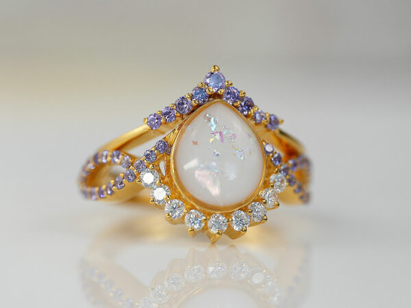 breastmilk jewelry ring crystals teardrop birth month color crystals teardrop from KeepsakeMom yellow gold set two rings purple