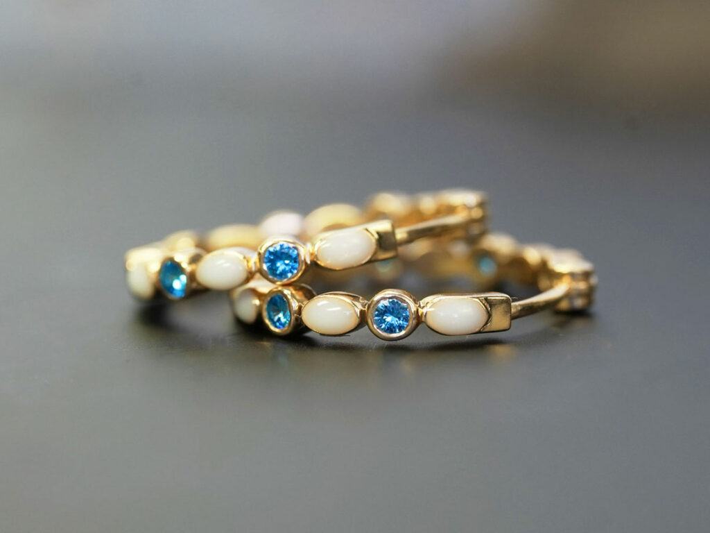 Breastmilk jewelry gold hoop earrings blue zircon December birth month color crystals from KeepsakeMom