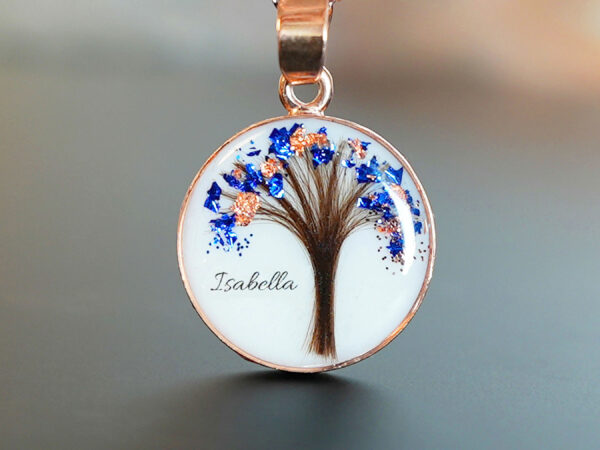 breastmilk jewelry disc necklace tree of life with baby's lock of hair and birth month color flakes tree KeepsakeMom rose and blue September tanzanite