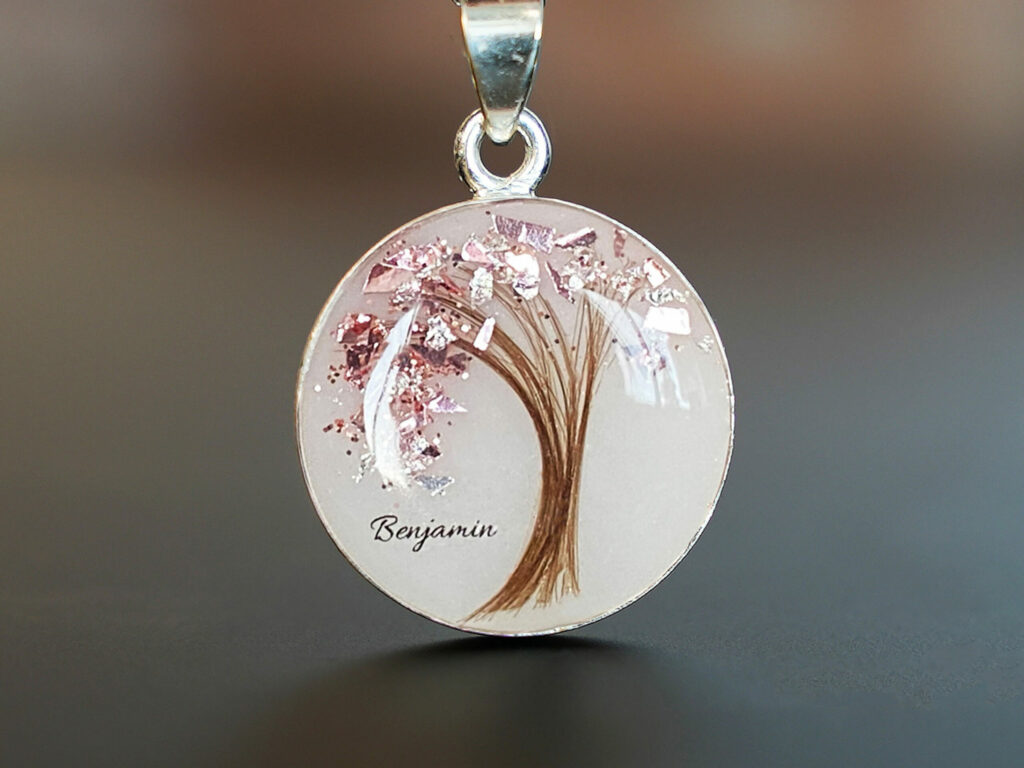 Breastmilk jewelry tree of life disc necklace with lock of hair and pink tourmaline October birth month color flakes as leaves from KeepsakeMom