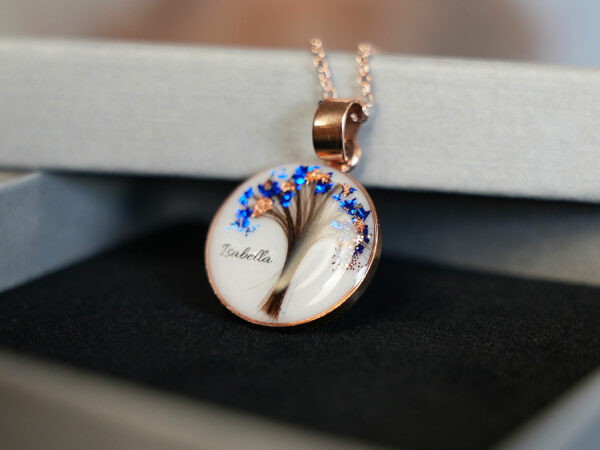 breastmilk jewelry disc necklace tree of life with baby's lock of hair and birth month color flakes tree KeepsakeMom rose and deep blue boxed