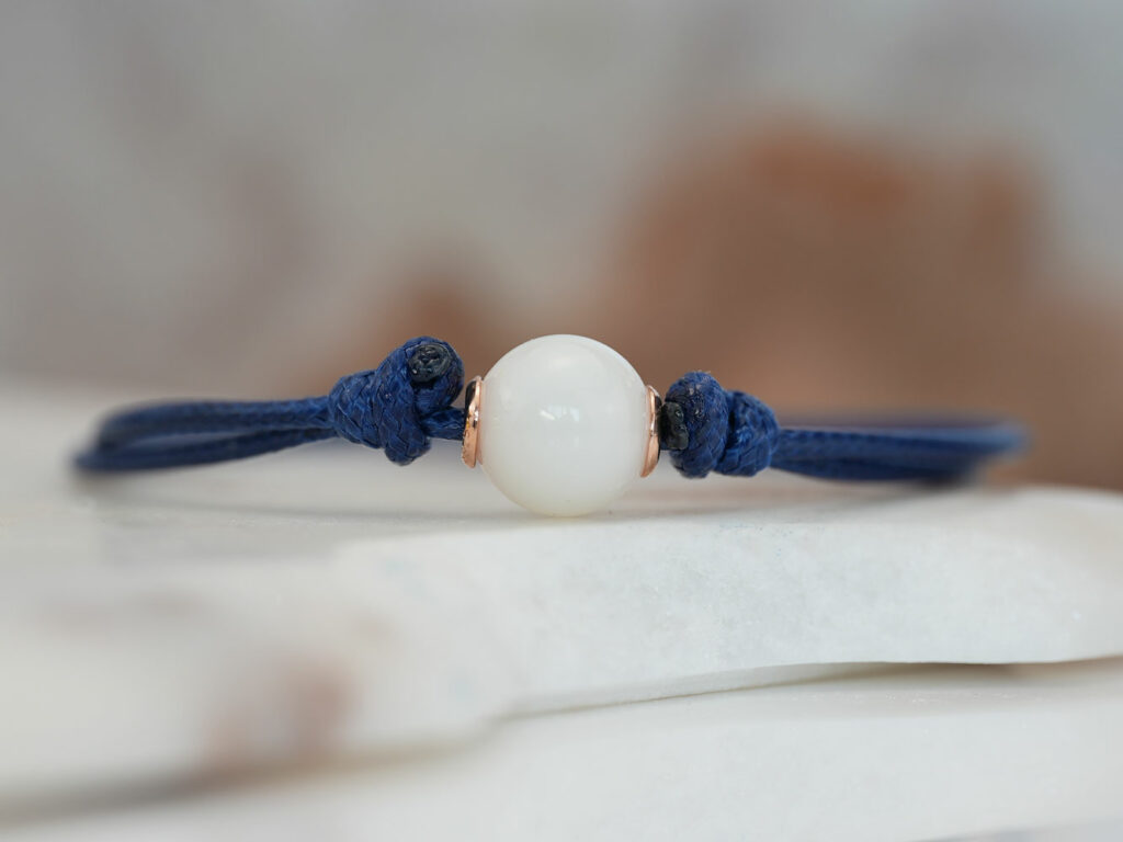 breastmilk jewelry september birth color sapphire September colored cord keepsakemom bracelet pearl bead