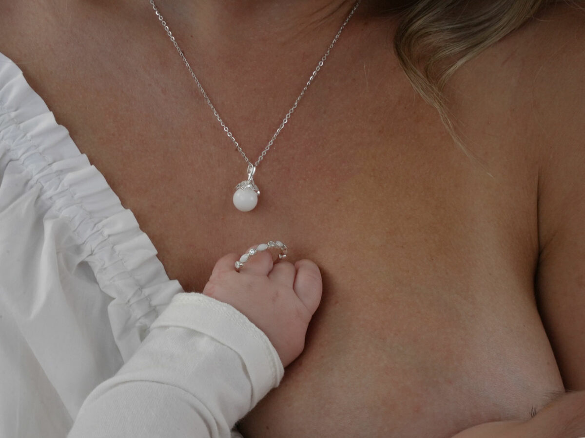 breastmilk jewelry ring and pearl necklace model mother baby from KreepsakeMom