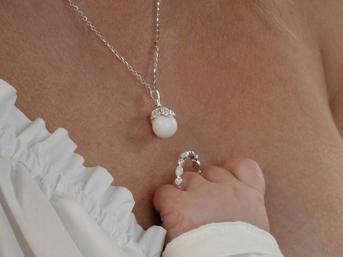 breastmilk jewelry ring and pearl necklace model mother baby from KreepsakeMom