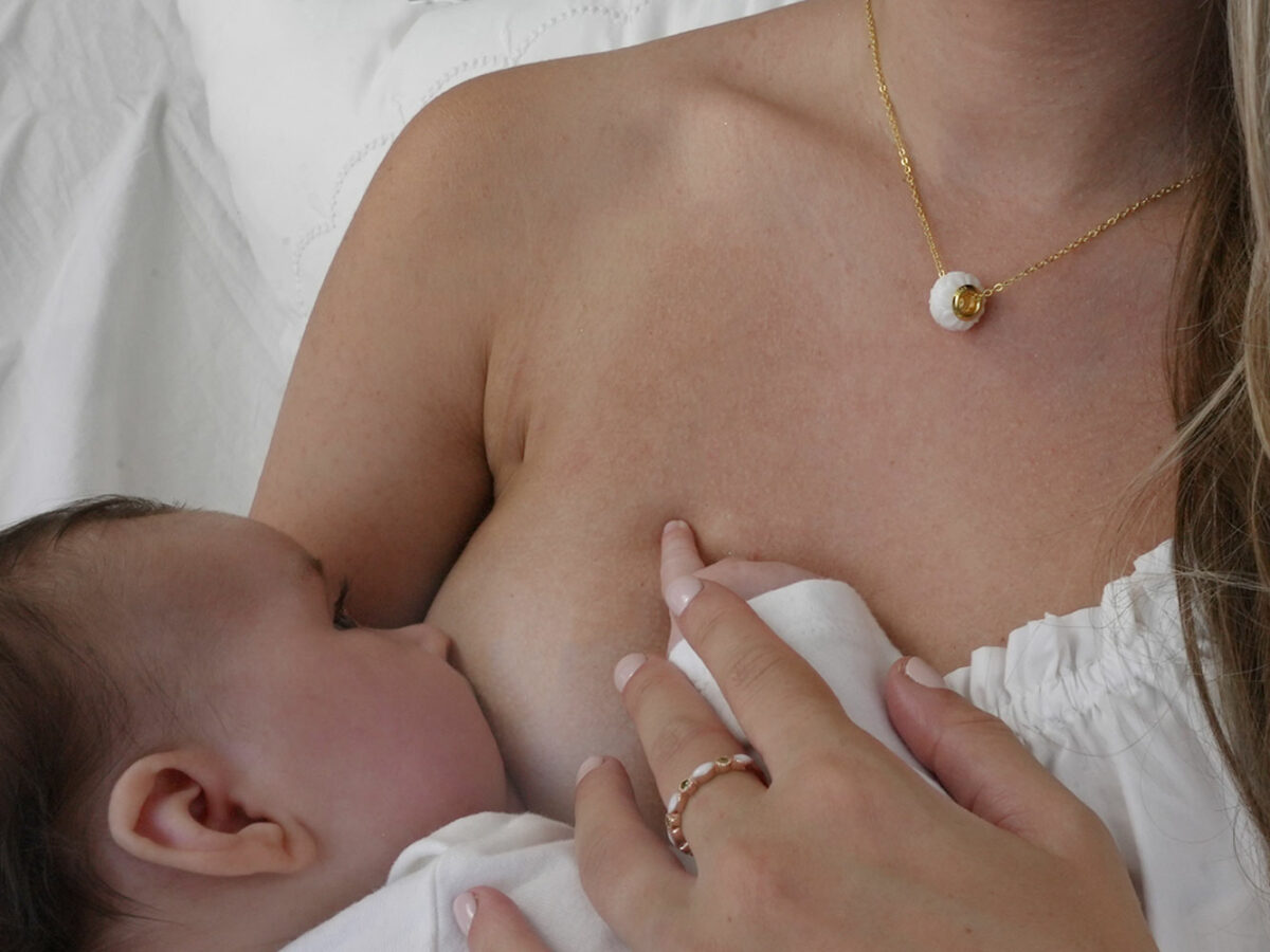 breastmilk jewelry necklace and fine band infinity ring model mother baby from KreepsakeMom