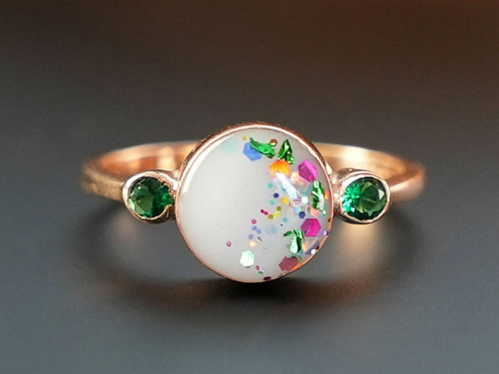 breastmilk jewelry round ring with may green emerald birth month color crystals and rainbow shimmer KeepsakeMom