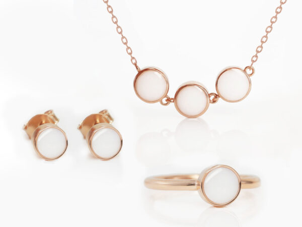 breastmilk jewelry set in rose gold simple on white background necklace ring and studded earrings from keepsakemom round shape