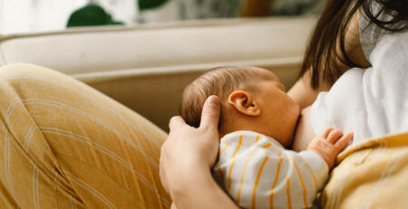 Newborn baby breastfeeding