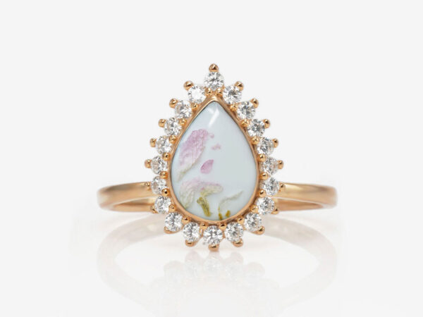 breastmilk ring teardrop in rose gold with crystals around and dry pink flowers in the breastmilk stone from keepsakemom