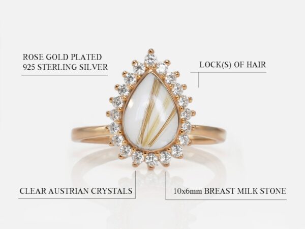 breast milk ring in rose gold teardrop shape with three lines of locks of hair and crystals around the breast milk stone on white background from keepsakemom