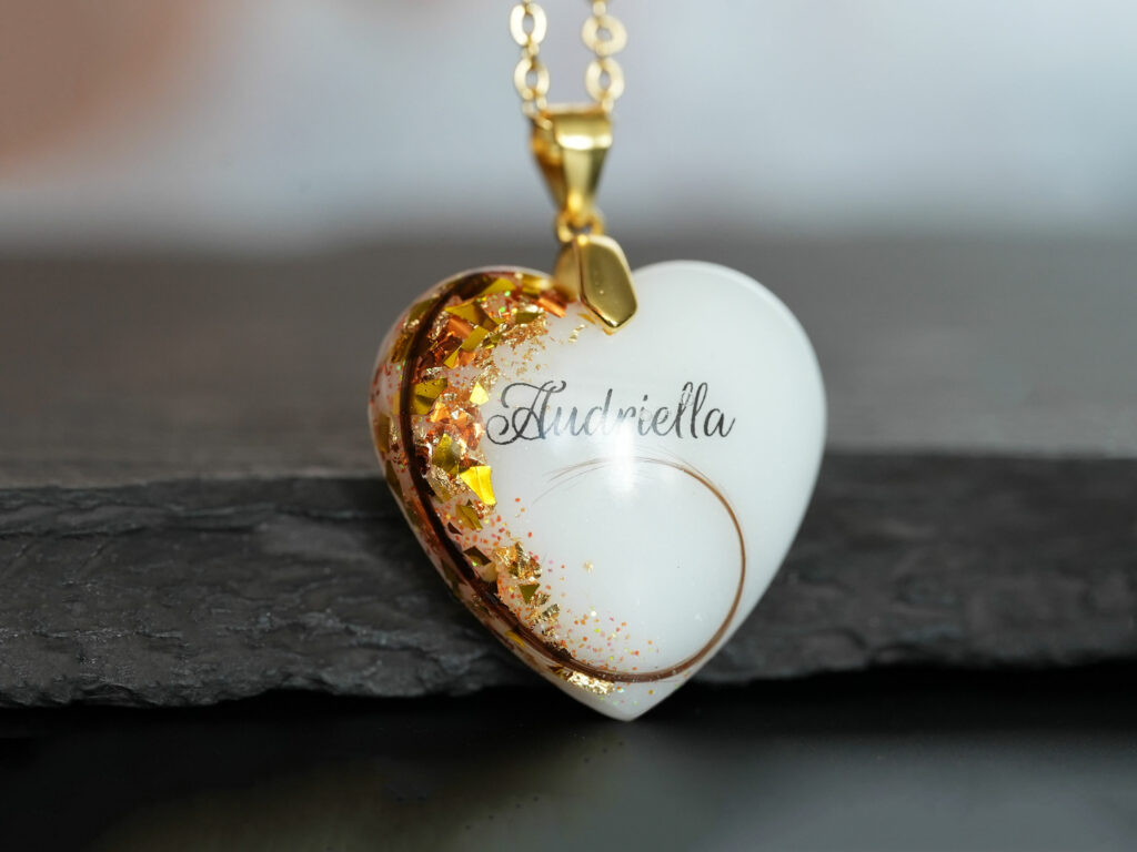 breastmilk jewelry heart necklace with November birth month yellow citrine stone color shimmers and flakes, name and hair from KeepsakeMom
