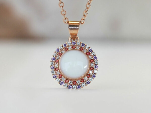 breastrmilk jewelry disc necklace flower sun birth month color crystals KeepsakeMom custom purple February and red garnet January