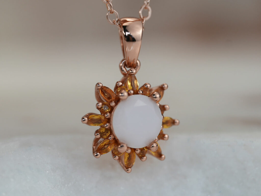breastmilk jewelry necklace star flower with November birth month yellow citrine stone color from KeepsakeMom