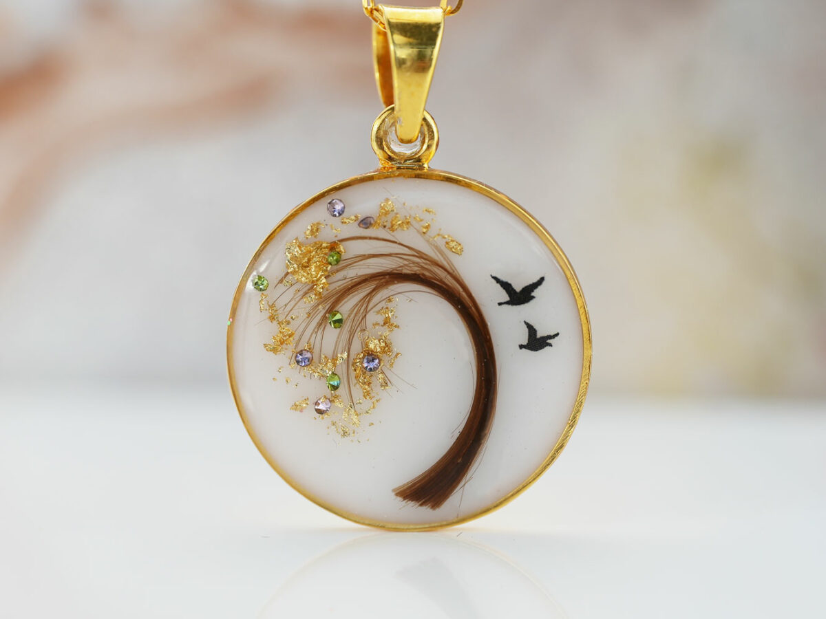 breastmilk jewelry disc necklace tree of life with baby's lock of hair and birth month color golden flakes tree and birds KeepsakeMom