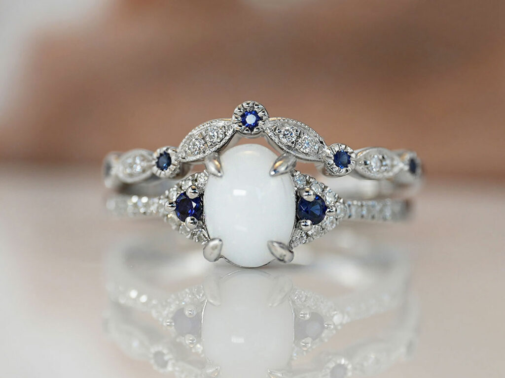 breastmilk jewelry oval ring birth month color September sapphire crystal KeepsakeMom