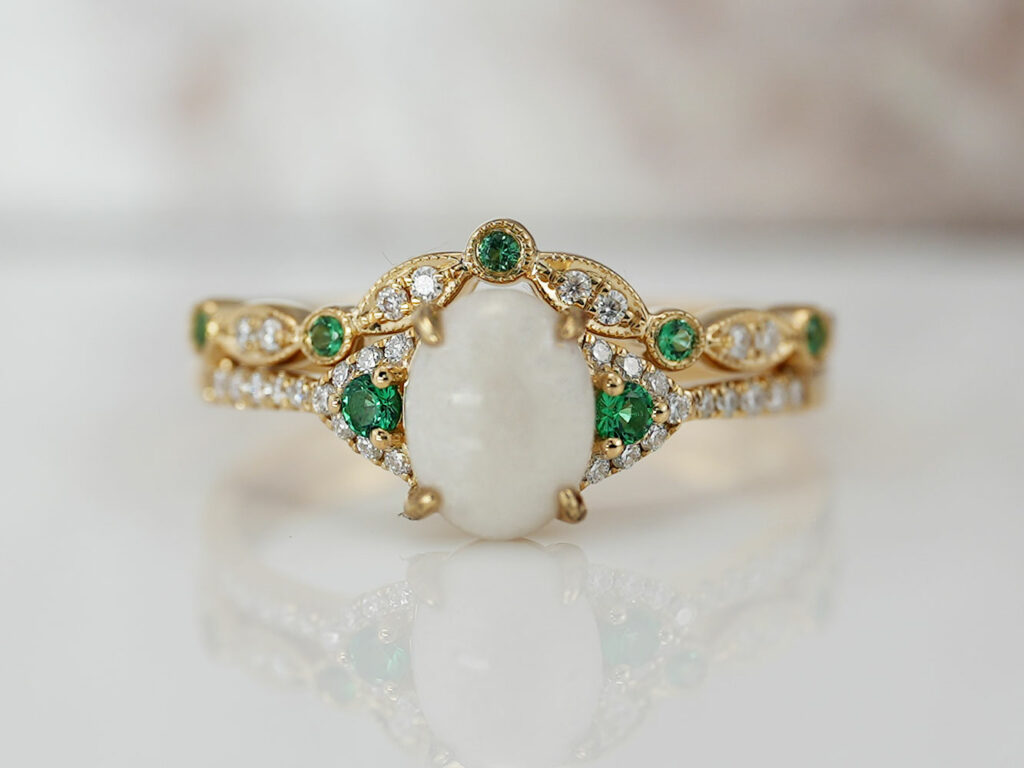 breastmilk jewelry yellow gold ring set with may emerald birth month color crystals gems rom keepsakemom