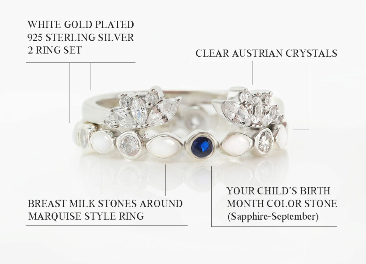 two ring set in write gold with breastmilk stones around the bottom ring, marquise style with central tiny crystal sapphire blue from keepsakemom