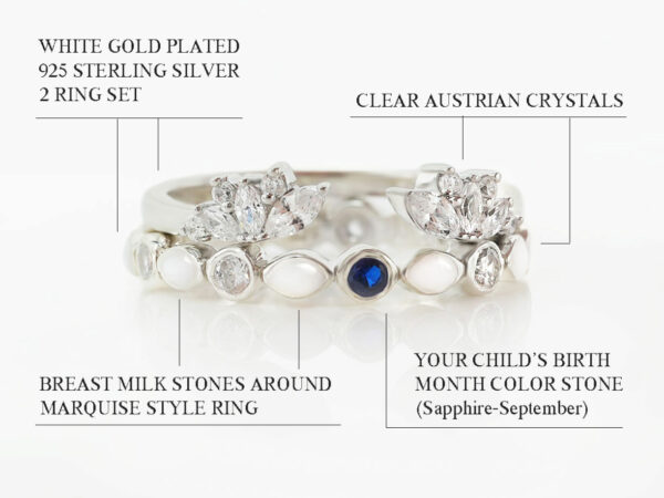 two ring set in write gold with breastmilk stones around the bottom ring, marquise style with central tiny crystal sapphire blue from keepsakemom