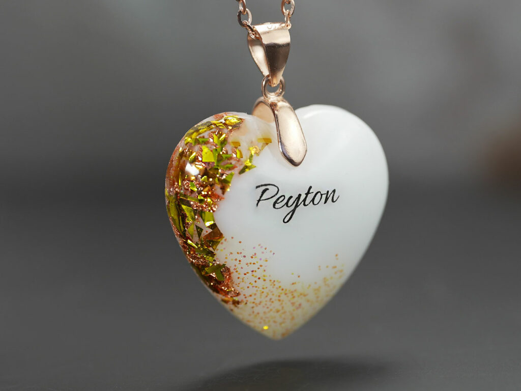 breastmilk jewelry heart necklace with November birth month yellow citrine stone color shimmers and flakes, name from KeepsakeMom