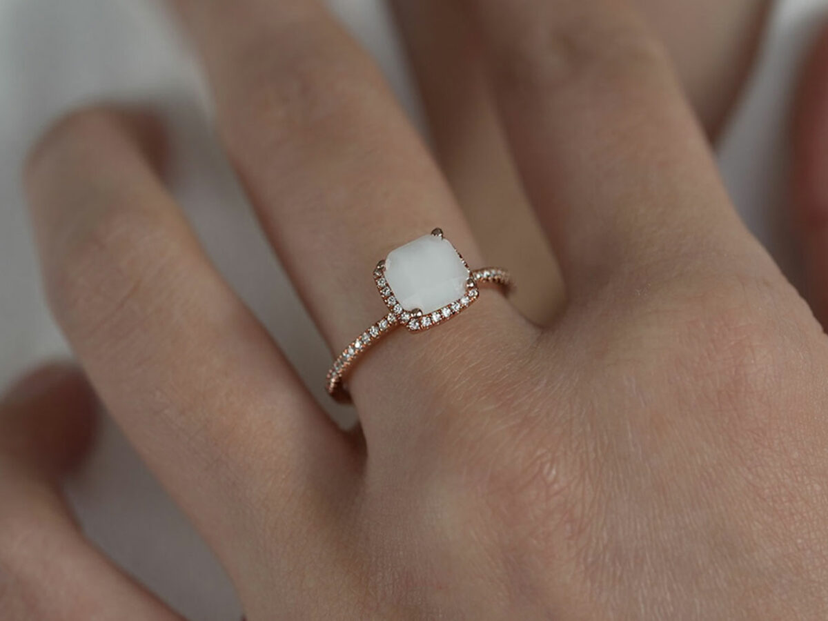 breast-milk-rose-gold-ring-with-square-diamond-stone-made-with-milk-keepsakemom model hand