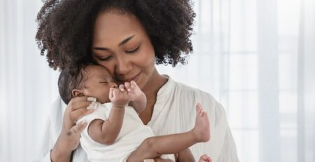 Mother holding her newborn baby