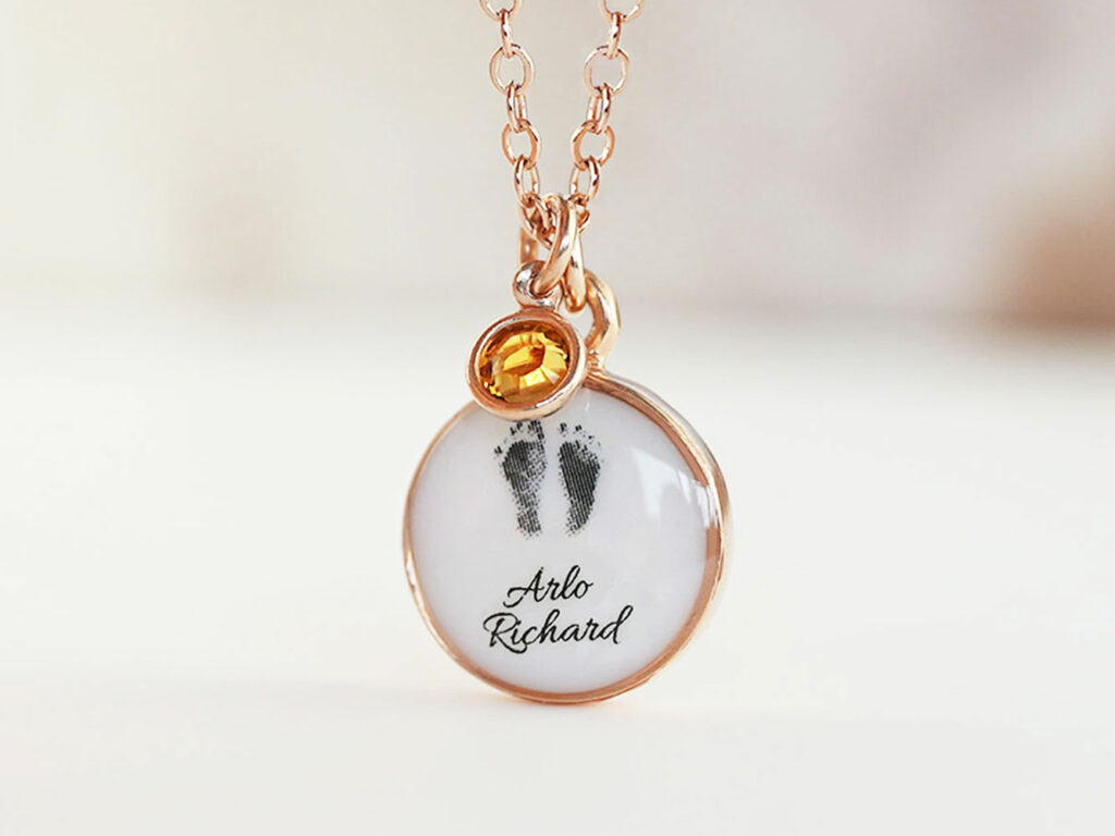 breastmilk jewelry necklace disc with foot prints and names with November birth month yellow citrine stone charm from KeepsakeMom