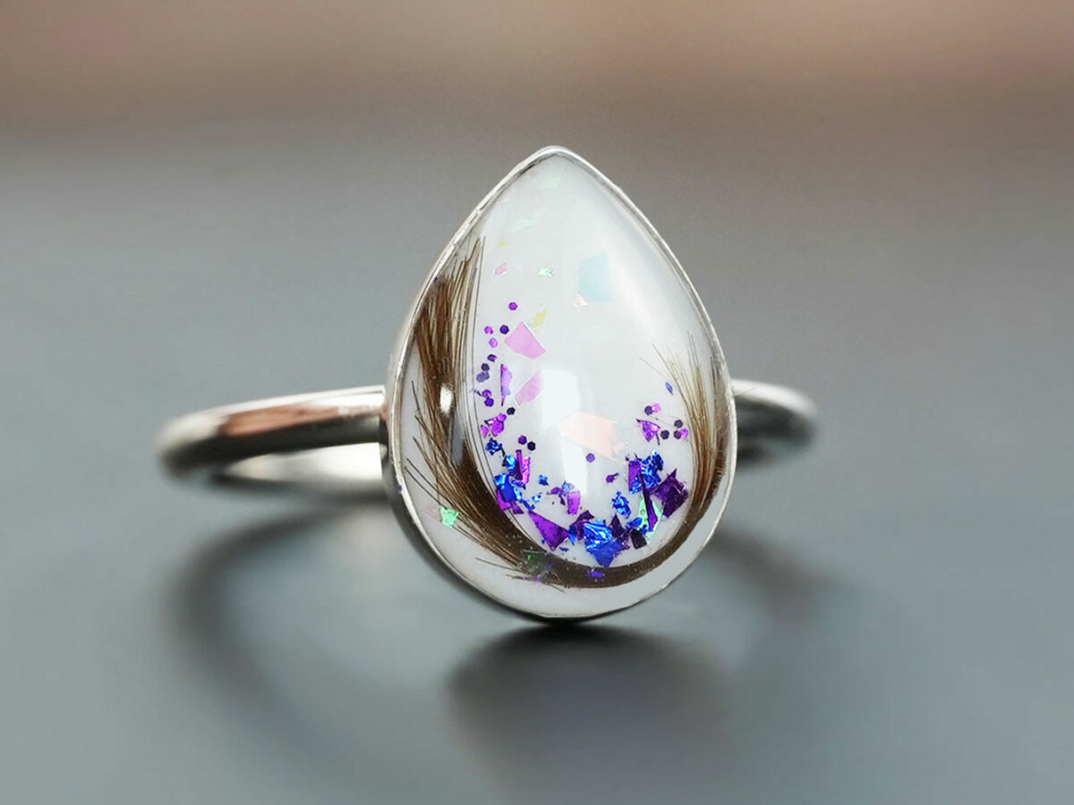 sterling silver teardrop ring, breast milk stone with February/June birth month flakes, opal flakes and hair from KeepsakeMom