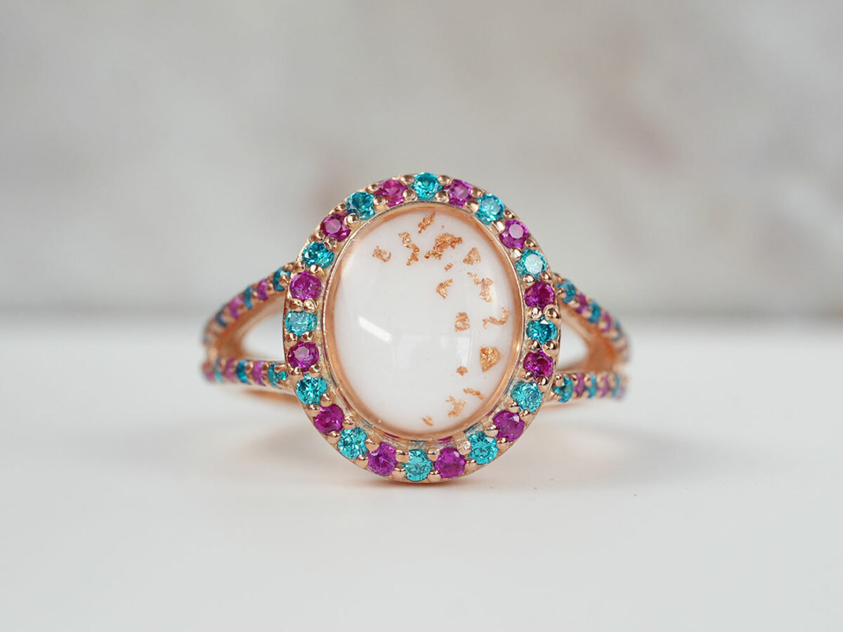 breastmilk jewelry oval rose gold ring crystals with birth month colors pink and blue from KeepsakeMom