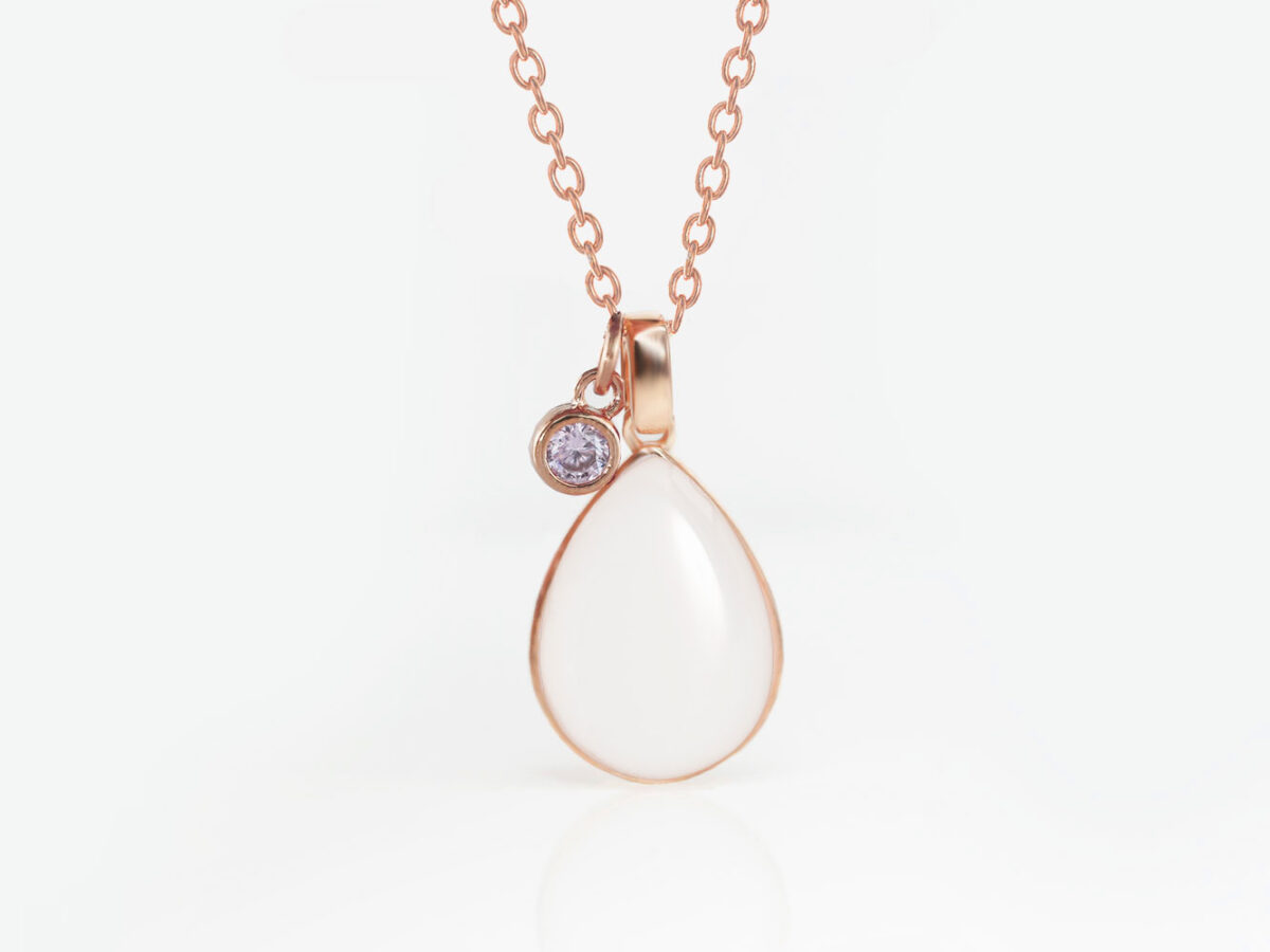 breastmilk teardrop necklace on white background with purple crystal charm from keepsakemom for diy kit