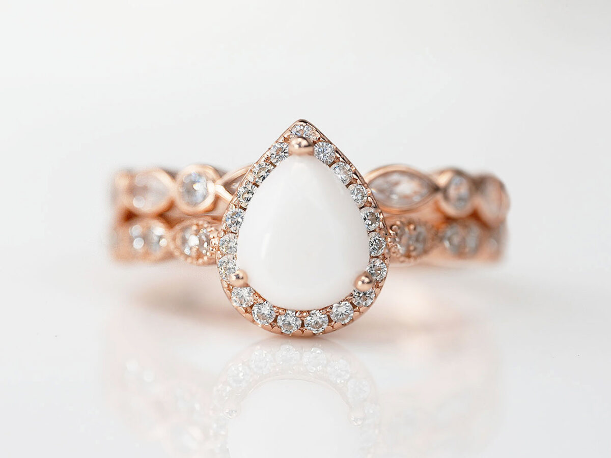 breastmilk jewelry ring set in rose gold setting pear shaped milk stone crystals two rows Keepsakemom