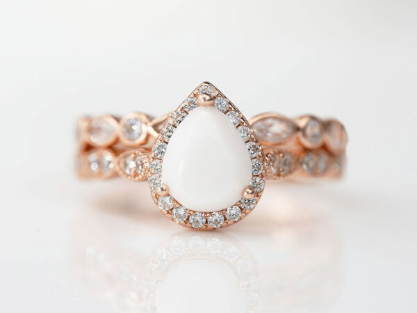 breastmilk jewelry ring set in rose gold setting pear shaped milk stone crystals two rows Keepsakemom