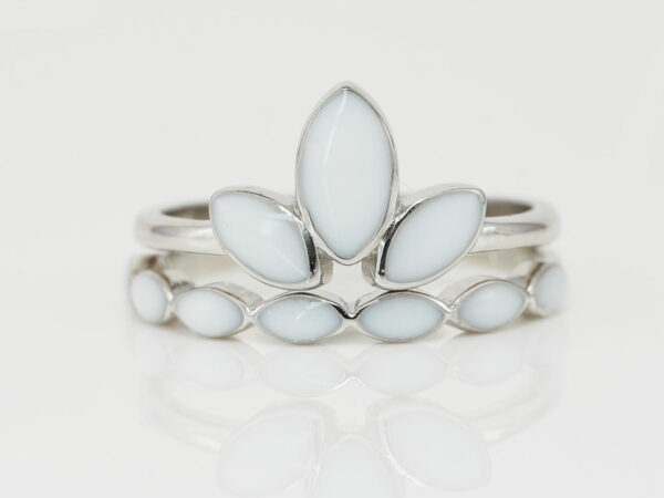 breastmilk jewelry ring leaves three stones lotus like from KeepsakeMom rose gold two ring setting with clear crystals add-on ring on the bottom in silver setting on white background