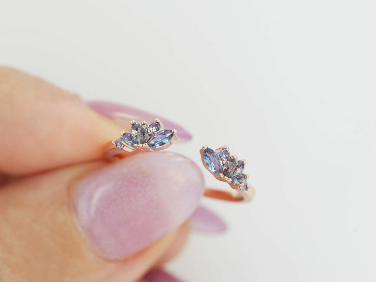 breastmilk jewelry add-on ring fine band KeepsakeMom rose gold blue crystals in a shape of wings adjustable model holding