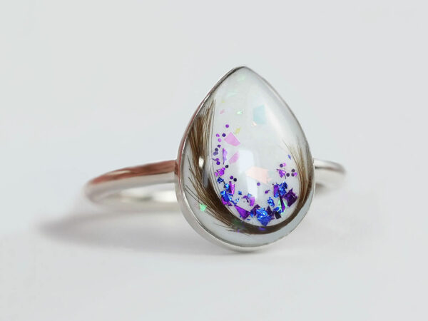 sterling silver teardrop ring, breast milk stone with february/june birth month flakes and hair from KeepsakeMom