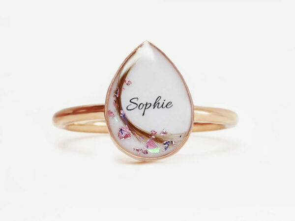 yellow gold plated sterling silver teardrop ring, breast milk stone with october birth month flakes, name and hair from KeepsakeMom