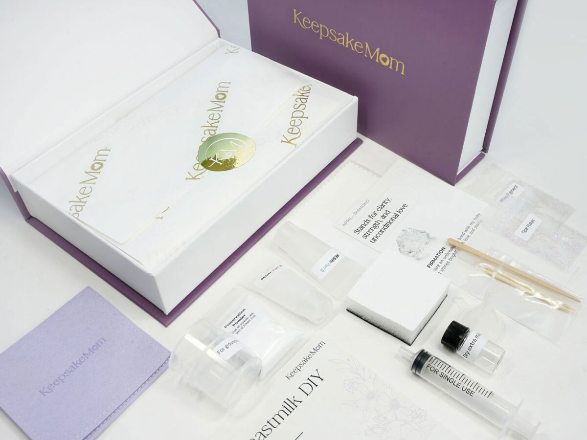 breastmilk jewelry DIY kit box contents with golden logo KeepsakeMom and purple box