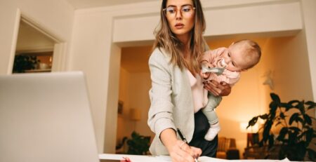 New mom working from home with baby