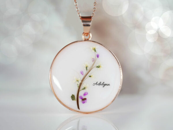 breastmilk jewelry disc necklace flower branch with baby's lock of hair and birth month color flakes KeepsakeMom