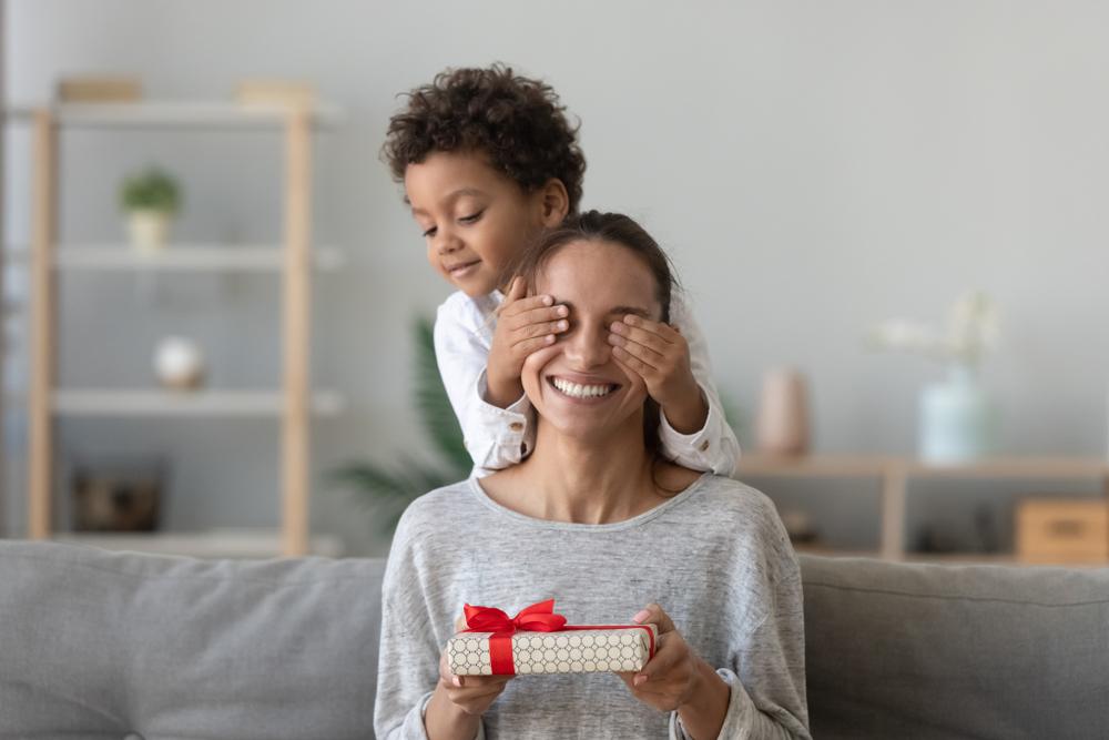 New mom being surprised with a gift