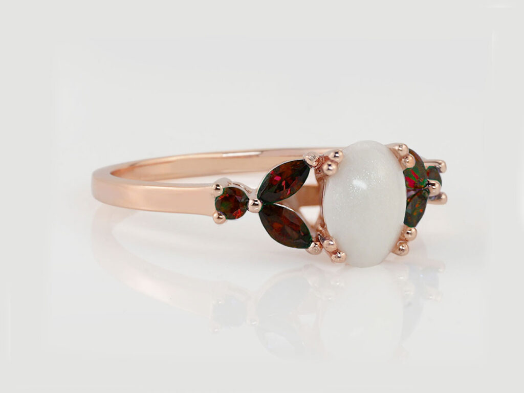 breastmilk jewelry ring birth month color garnet January rose gold with oval stone from KeepsakeMom