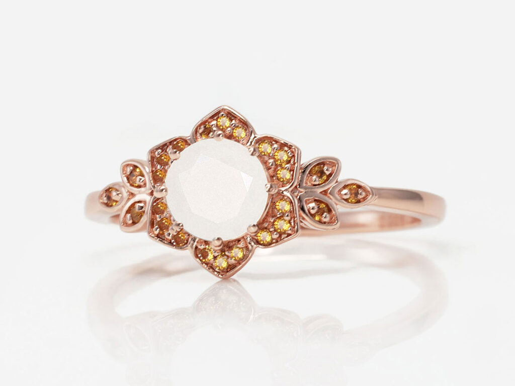 breastmilk jewelry flower shape yellow gold ring with November birth month yellow citrine stone color from KeepsakeMom