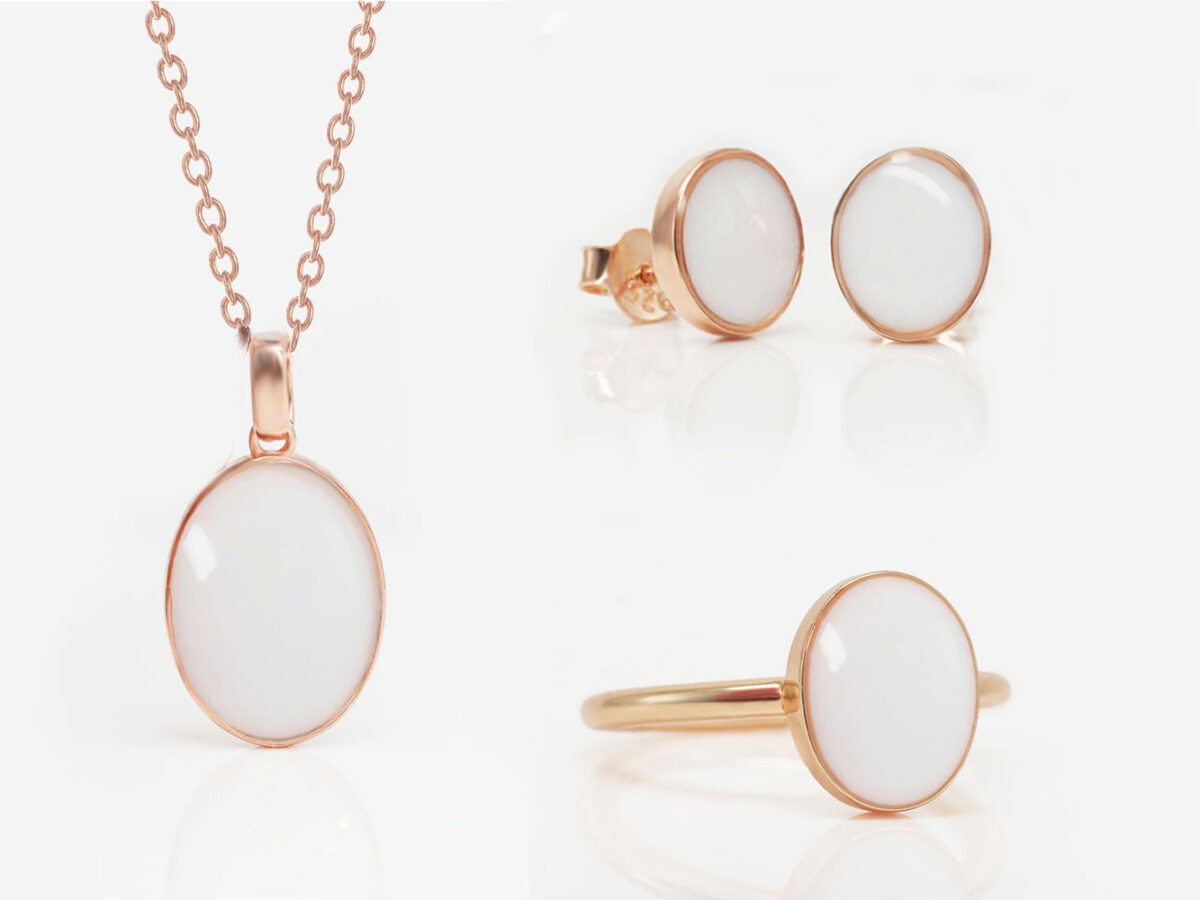 white background necklace ring and studded earrings from keepsakemom oval shape